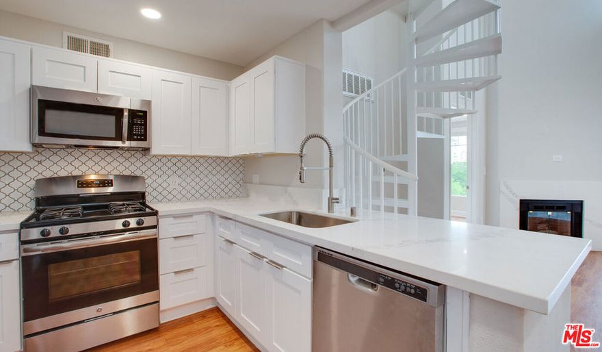 Fantastic apartment opportunity in prime Beverly Grove! Two bedroom & two bathroom PLUS Loft. Kitchen equipped with quartz countertops, stainless steel appliances including a refrigerator, gas stove & oven. Laundry in Unit, A/C, top of the line, no expense was spared! Beautiful location near The Grove, great for work from home, & close to all amenities! Gated community w secured parking including EV, 24/7 security patrol, biometric access, smart homes (alerts you if the door opens!), secured elevator access, salt water pool, state of the art gym, concierge, clubhouse, & spa!
