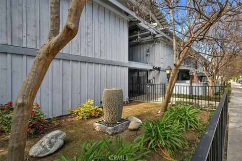 Photo of 5447 Zelzah Ave #110, Encino, CA 91316 (MLS # SR26024448)