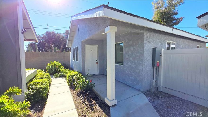 This newly built 2024 stand-alone casita, located at 1016 W Bennington St. in a quiet Upland cul-de-sac, offers modern single-story living with solar included for exceptionally low electric bills. The home features 2 bedrooms and 1 bathroom, a bright and spacious living room, and a beautifully upgraded open kitchen with ceiling-height cabinets, a pantry, brand-new appliances, quartz countertops, a subway tile backsplash, bar seating, and a large stainless-steel sink. Additional highlights include premium flooring throughout, a hallway stackable washer and dryer, LED recessed lighting, an energy-efficient A/C and heating system, and all-new 2” wood blinds. Outside, enjoy a private fenced yard with sliding door access and a dedicated parking stall with EV charger that fits two vehicles. The bathroom features a floor-to-ceiling quartz shower, and water and trash services are included—creating a stylish, efficient, and comfortable place to call home.