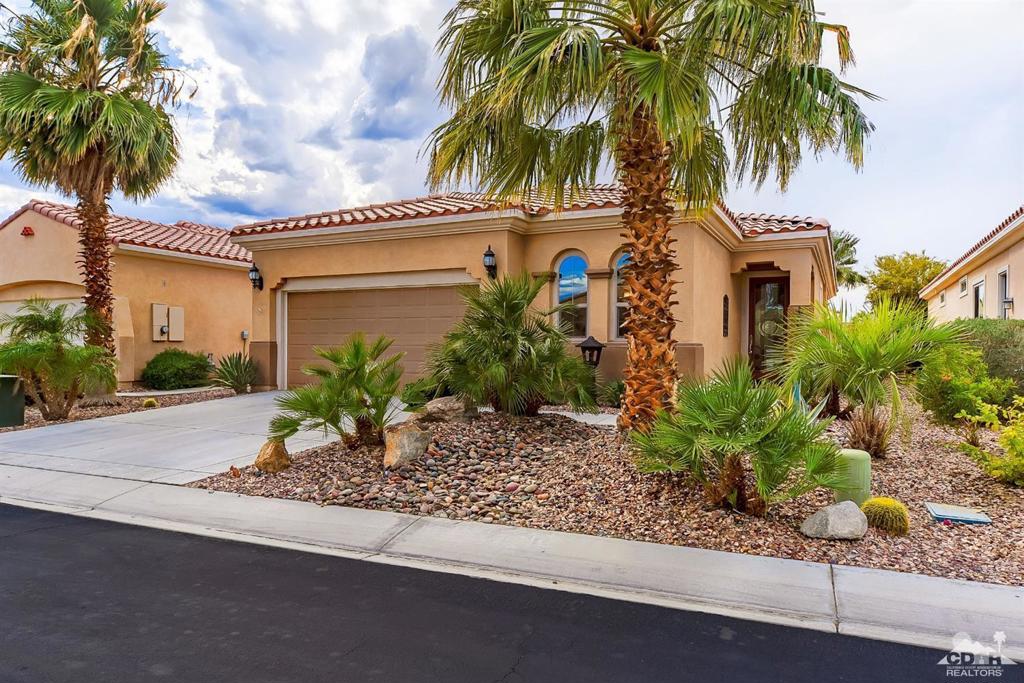 PHOTOS COMING SOON!! 55 + community. This exceptional Montoya model, located on a tranquil street, offers 1,432 square feet of beautifully designed living space. With 2 bedrooms plus a versatile den currently furnished with a queen bed, this home comfortably accommodates guests.From the moment you arrive, the curb appeal is undeniable--featuring elegant hip roof lines, striking arched windows, mature landscaping, and a decorative cut-glass entry door.Step inside to find freshly painted interiors, stylish tile flooring, and upgraded ceiling fans and light fixtures that create a polished, cohesive atmosphere throughout. The open-concept layout connects the spacious great room with the eat-in kitchen--perfect for both entertaining and everyday living.The kitchen is a chef's delight, offering granite countertops, high-quality cabinets with lower pull-out shelves, stainless steel appliances, a bright dining nook, and a stool-height breakfast bar that flows seamlessly into the living space.This move-in-ready gem is waiting for you--pack your bags and book now!