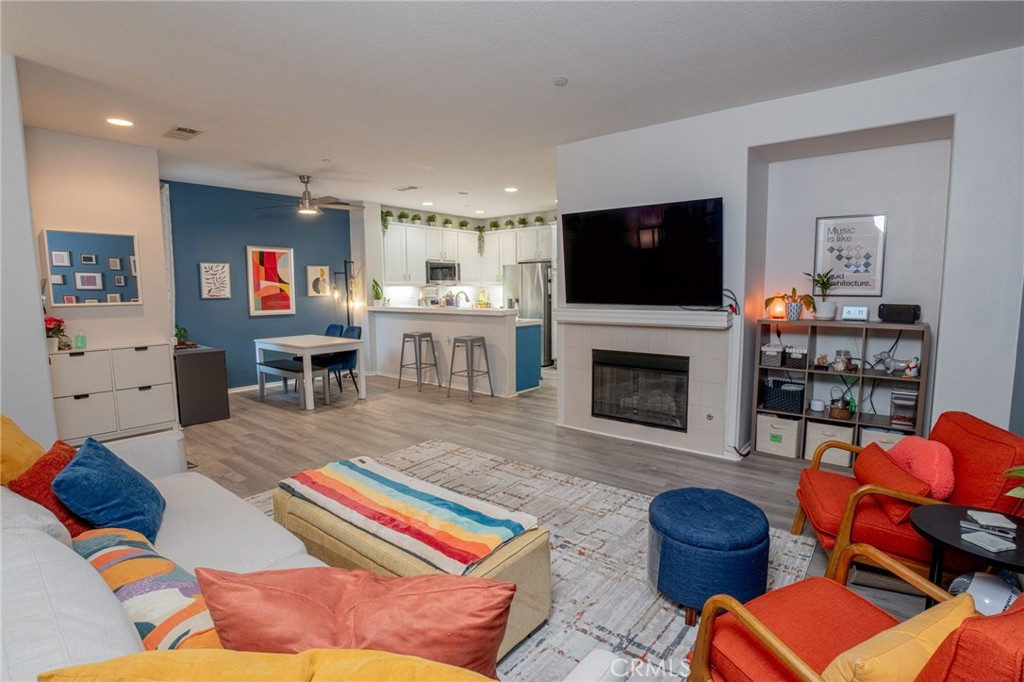 Tucked into the heart of Skyview Ridge, this 3-bedroom, 2.5-bath condominium offers the rare combination of warmth, privacy, and convenience. With 1,472 square feet of thoughtfully designed living space, the home features an open-concept layout, tasteful upgrades, and a direct-access 2-car garage.
What truly sets this home apart is its storybook entry. A tree-lined pathway leads to a charming gated patio, shaded by a mature canopy-style tree that casts dappled light throughout the day. The patio feels both quaint and secluded—a peaceful setting perfect for morning coffee, quiet reading, or weekend entertaining.
Families benefit from Menifee K-8 schools, and this home falls within the boundary for Liberty High School, offering a newer campus and modern educational facilities nearby.. It's also just steps from the new Costco shopping center and minutes to dining, retail, and the 215 Freeway, offering both lifestyle and location.
Residents enjoy access to resort-style amenities including a pool, spa, playground, and walking paths. With a rare blend of comfort, privacy, and proximity to everything Murrieta has to offer, this home is a must-see.