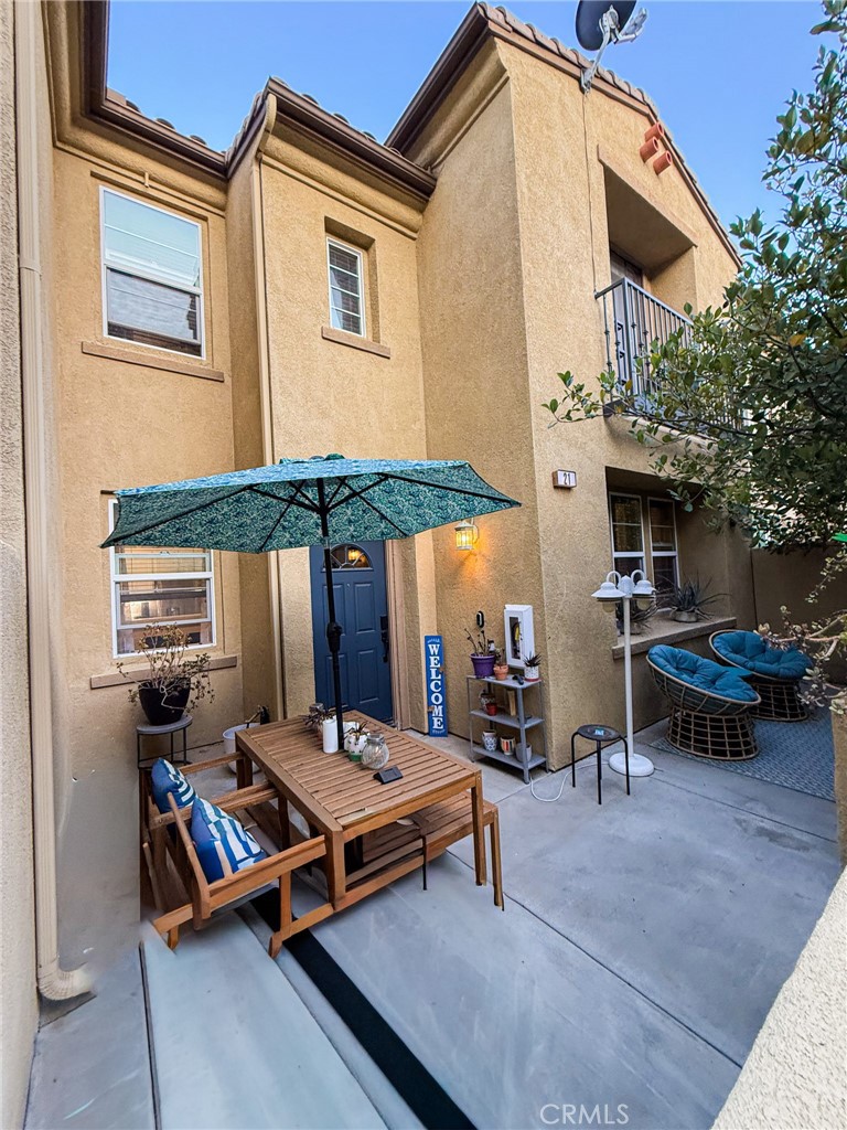 Tucked into the heart of Skyview Ridge, this 3-bedroom, 2.5-bath condominium offers the rare combination of warmth, privacy, and convenience. With 1,472 square feet of thoughtfully designed living space, the home features an open-concept layout, tasteful upgrades, and a direct-access 2-car garage.
What truly sets this home apart is its storybook entry. A tree-lined pathway leads to a charming gated patio, shaded by a mature canopy-style tree that casts dappled light throughout the day. The patio feels both quaint and secluded—a peaceful setting perfect for morning coffee, quiet reading, or weekend entertaining.
Families benefit from Menifee K-8 schools, and this home falls within the boundary for Liberty High School, offering a newer campus and modern educational facilities nearby.. It's also just steps from the new Costco shopping center and minutes to dining, retail, and the 215 Freeway, offering both lifestyle and location.
Residents enjoy access to resort-style amenities including a pool, spa, playground, and walking paths. With a rare blend of comfort, privacy, and proximity to everything Murrieta has to offer, this home is a must-see.