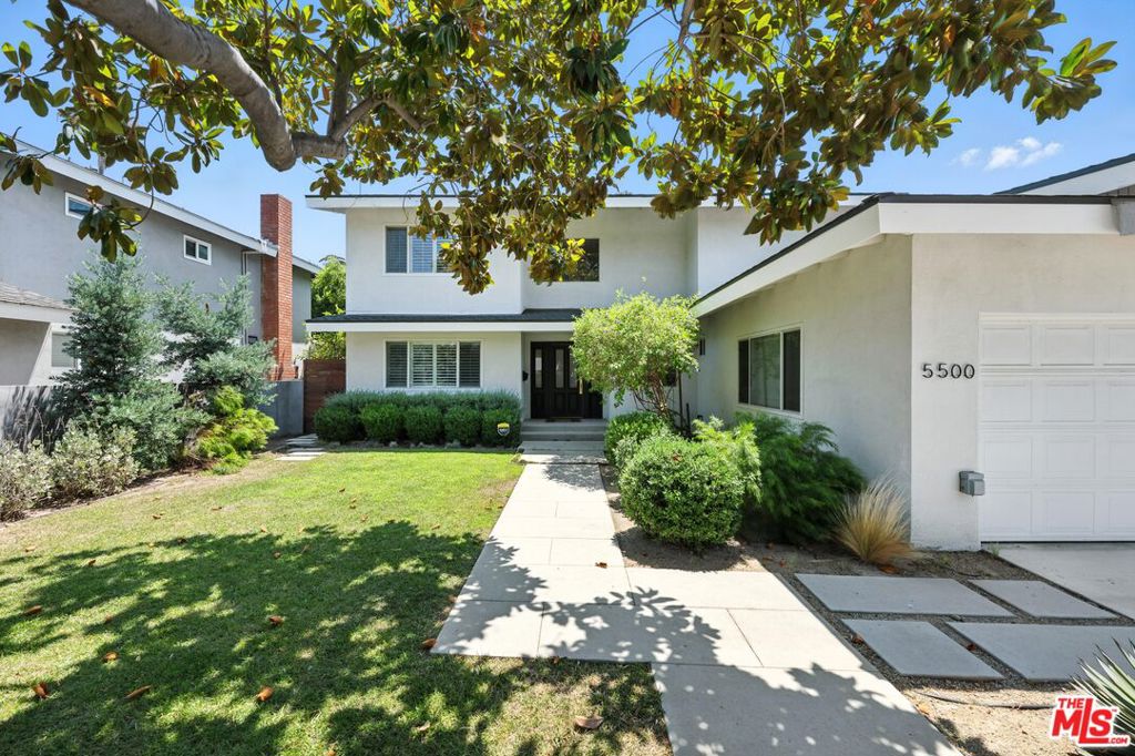 Introducing this incredible Sherman Oaks opportunity....Remodeled and updated traditional modern 4-bedroom, 3.5-bathroom home located in the highly sought-after Chandler Estates neighborhood on a quiet cul-de-sac. This thoughtfully designed home features a spacious open floor plan with refinished hardwood floors, a large sunken living room with fireplace, and a separate den/office off the foyer. The light-filled kitchen offers ample counter space, a walk-in pantry, and top-of-the-line stainless steel appliances. All four bedrooms are situated upstairs, including a generous primary suite with soaring ceilings, a walk-in closet, and a built-in desk area. Each bathroom has been tastefully redone with high-quality finishes. The finished garage provides flexibility for use as a home gym, playroom, or creative space. Outside, enjoy a private backyard with a large deck ideal for outdoor living and entertaining, plus a grassy yard with plenty of space for a pool.A rare opportunity in one of the Valley's most charming neighborhoods.