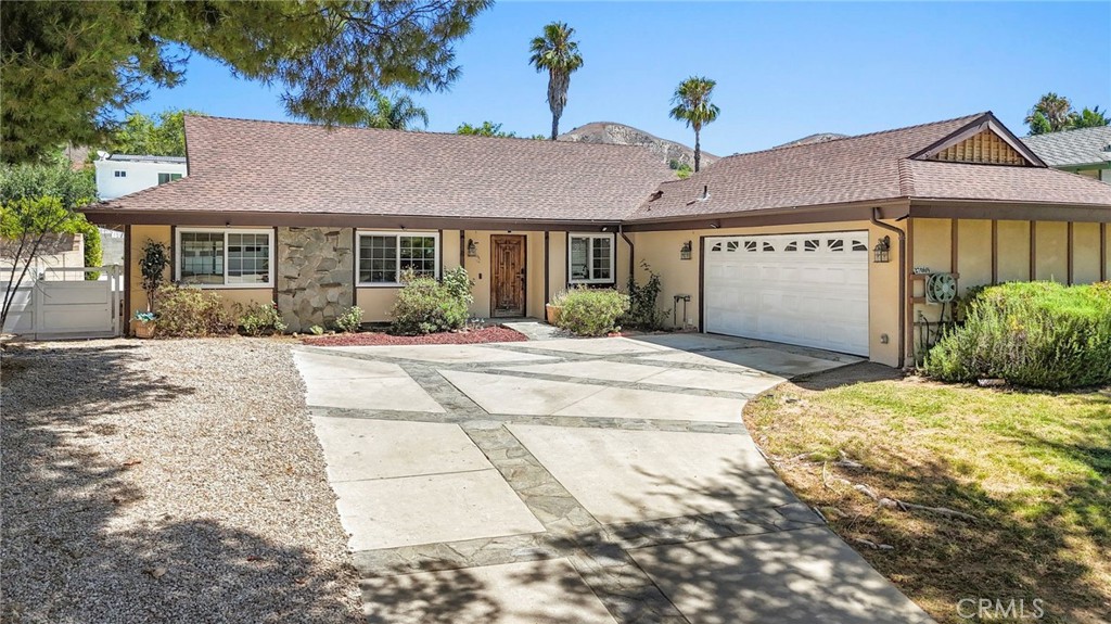 Welcome to this spacious and versatile 5-bedroom, 4.5-bathroom home, 3 car garage, 11,383 sqft lot!! located in a peaceful cul-de-sac with no neighbors on one end, offering privacy and tranquility. This home boasts a generous layout with 1 bonus room that can easily be transformed into a playroom, exercise room, office, or anything else you desire. The bonus rooms has a separate entrance, providing added flexibility for guests or home-based work. The modern kitchen is a standout feature with a Quarts countertop/ Island offering sleek cabinetry, updated appliances, and plenty of counter space, perfect for preparing meals for family and friends. The open great room concept allows for easy flow between the kitchen, dining, and living areas, making it ideal for entertaining. Tile flooring flows throughout the home, offering both style and durability. For added convenience, the washer, dryer, and two refrigerators (one in the kitchen and one in the garage) will stay with the home. The large yard is perfect for outdoor gatherings, barbecues, or just relaxing in the fresh air. Two of the bedrooms have en-suite bathrooms, providing a private retreat for the occupants. The home also features a cozy gas/electric combination fireplace, ideal for those chilly evenings. Stay comfortable year-round with central air conditioning and enjoy the convenience of two attics with ladder access, offering plenty of storage space. For pet owners, there's a dedicated dog run to keep your furry friends safe and secure. Parking is a breeze with a driveway that can accommodate up to three cars. This home is located in an excellent school district, making it a great choice for families. The quiet, family-friendly neighborhood is also close to parks, shopping, and hiking trails, providing a perfect balance of convenience and relaxation. Don’t miss the chance to make this wonderful house your new home!