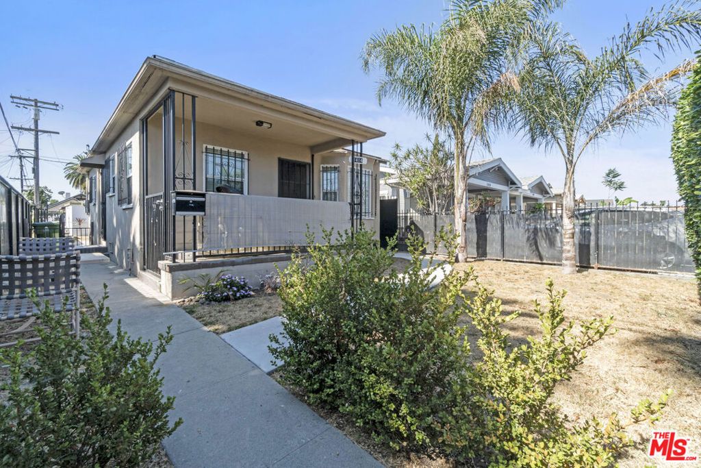 Photo of 1414 W 54th Street, Los Angeles, CA 90062 (MLS # 26634921)