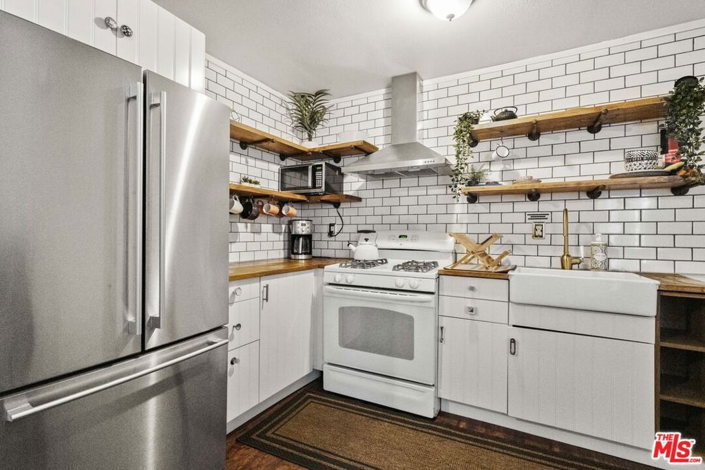 Photo of 1414 W 54th Street, Los Angeles, CA 90062 (MLS # 26634921)