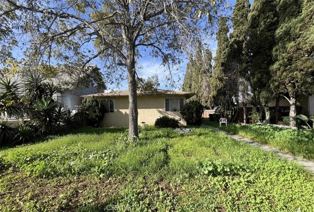 Photo of 3013 Halldale Avenue, Los Angeles, CA 90018 (MLS # DW25279578)