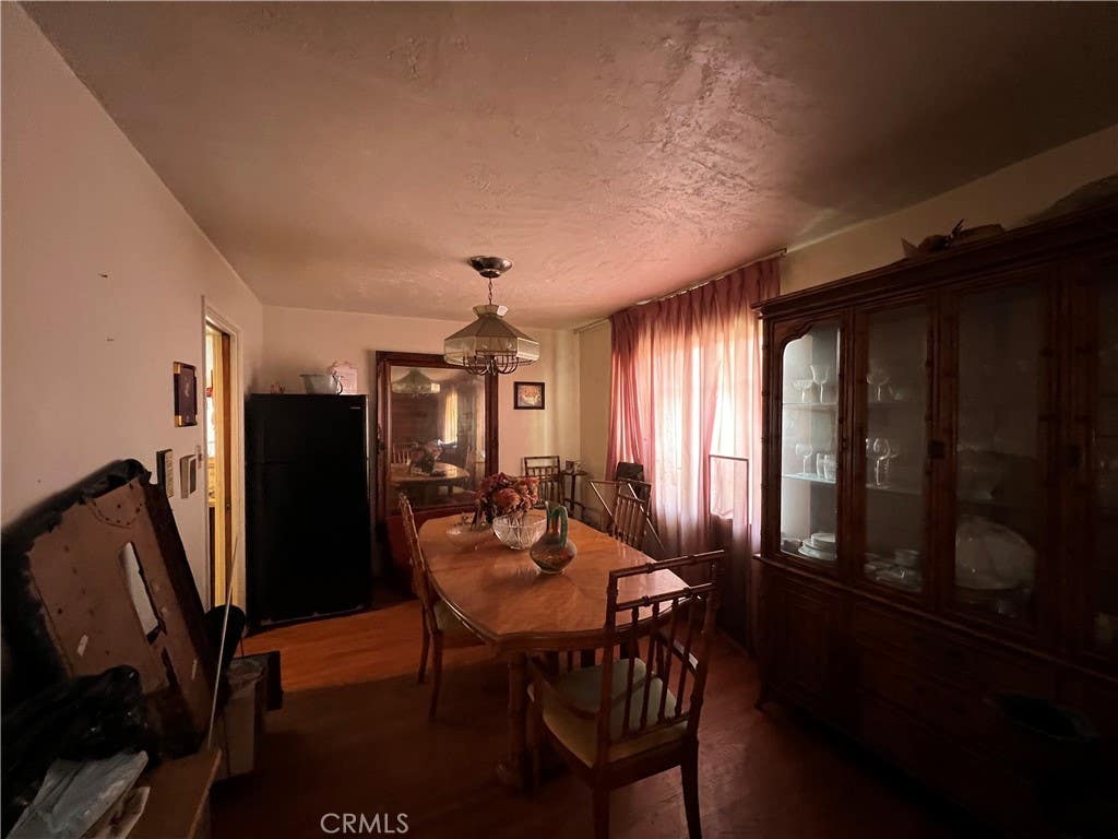 Photo of 3013 Halldale Avenue, Los Angeles, CA 90018 (MLS # DW25279578)