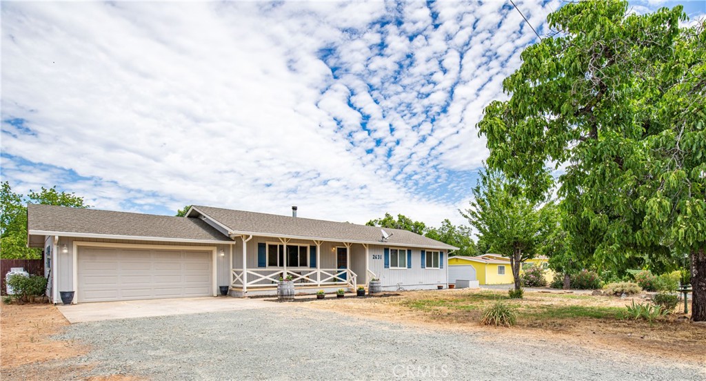 Charming California Ranch style home on 1.17 Acres offers peaceful surroundings and great location!
Welcome to this wonderful 3-bedroom, 2-bath ranch-style home perfectly situated on a generous 1.17-acre lot, just minutes from town but tucked away on a quiet dead-end street for the ultimate in privacy and tranquility.
From the moment you arrive, you'll be drawn in by the home's inviting curb appeal and the lovely front porch—a perfect spot to sip your morning coffee or unwind in the evening. Step inside to discover a warm and welcoming interior that blends comfort with function. The spacious living area features a cozy wood-burning stove, ideal for chilly nights, and a newer HVAC system ensures energy-efficient comfort year-round. Owners just had interior walls professionally painted, and exterior paint was done only a few years ago.
The home’s single-level layout offers ease of living, with three well-sized bedrooms and two bathrooms thoughtfully arranged for privacy and practicality. The kitchen and dining areas provide ample space for both everyday meals and entertaining, with easy access to the back deck and backyard.
Outdoors, you'll find your own personal oasis. The backyard is fully fenced—perfect for pets or play—and shaded by mature oak trees that add beauty and character to the landscape. A lap pool offers a refreshing escape on warm days and is a rare feature that sets this home apart. Whether you enjoy gardening, grilling, or simply relaxing in nature, this property offers endless opportunities to enjoy the outdoors.
Space to park RV or boat by side of house or inside the gated acreage. A cute tool shed is perfect for keeping yard tools and more out of the way.
Located just outside city limits, you’ll enjoy the peace of country living without sacrificing convenience. Schools, shopping, dining, and services are all within a short drive. This property is perfect for families, retirees, or anyone looking to enjoy space, serenity, and a true sense of home.
Don’t miss your chance to own this special property that combines charm, privacy, and practical amenities—all in a highly desirable location. Schedule your private showing today!