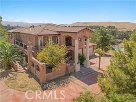 Stunning Custom Home with Panoramic Views in Choctaw Valley
This beautifully crafted 5-bedroom, 4-bath residence sits on 2.97 acres and offers a perfect balance of luxury and privacy. Expansive wraparound balconies showcase breathtaking views of Lake Ming and the surrounding foothills.
Inside, the home welcomes you with a dramatic grand entry leading to formal living and dining areas. The chef’s kitchen is complete with double ovens, a walk-in pantry, and abundant cabinetry, while an upstairs laundry adds everyday convenience. The spacious owner’s suite includes dual closets and striking views. A versatile media room provides additional living space and can function as a junior suite.
Outdoor amenities include a covered patio with a full outdoor kitchen, ideal for entertaining. The property also features a private well with well house, oversized 3-car garage, and ample space for horses or future expansion. This estate is designed for comfort, functionality, and exceptional views.