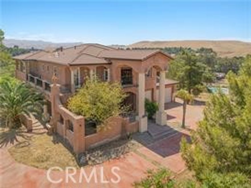 Stunning Custom Home with Panoramic Views in Choctaw Valley

This beautifully crafted 5-bedroom, 4-bath residence sits on 2.97 acres and offers a perfect balance of luxury and privacy. Expansive wraparound balconies showcase breathtaking views of Lake Ming and the surrounding foothills.



Inside, the home welcomes you with a dramatic grand entry leading to formal living and dining areas. The chef’s kitchen is complete with double ovens, a walk-in pantry, and abundant cabinetry, while an upstairs laundry adds everyday convenience. The spacious owner’s suite includes dual closets and striking views. A versatile media room provides additional living space and can function as a junior suite.



Outdoor amenities include a covered patio with a full outdoor kitchen, ideal for entertaining. The property also features a private well with well house, oversized 3-car garage, and ample space for horses or future expansion. This estate is designed for comfort, functionality, and exceptional views.