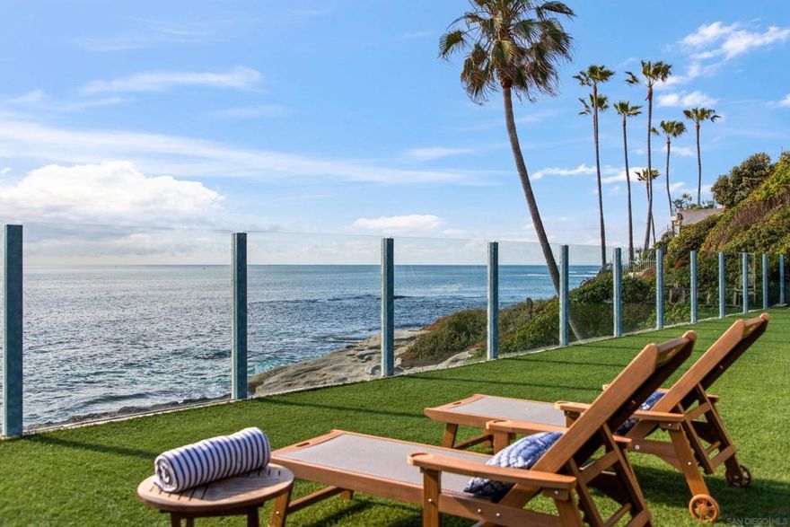 Nestled in the Bird Rock neighborhood of La Jolla, this luxurious 1bedroom, 1.5 bathroom retreat offers breathtaking oceanfront views and private beach access at low tide. With direct access to a private beach, you will enjoy a serene escape just steps from the water. The spacious outdoor areas, shared with the main house, include a jacuzzi, a built-in BBQ, multiple lounge areas, and sweeping views of the Pacific. The unit sits adjacent to the main house and is not fully private, as it shares outdoor spaces with another unit. Inside, the open living space features a full open-concept kitchen, a dining area, and a comfortable seating area with a plush couch and flat-screen TV.  Up a few steps, just past the half bathroom, you will find a beautifully integrated dry sauna, one of the home’s standout amenities and perfect for post-beach relaxation. The bedroom, located upstairs, is an oceanview retreat with expansive windows, a queen-sized bed, and a private balcony that features outdoor seating. Outside, there is an outdoor patio, an expansive turf yard, and direct beach access to a private beach at low tide. Sleeping Accommodations (Maximum Occupancy 2): Bedroom 1 - 1 Queen bed - 1 full bathroom and 1 half bathroom STR-11550L TOT-643716 An additional 1-bedroom, 1-bathroom unit, 6276, is also available and can be rented separately or together for extra space. This unit sits adjacent to the main house, which is occupied, and shares some outdoor space.