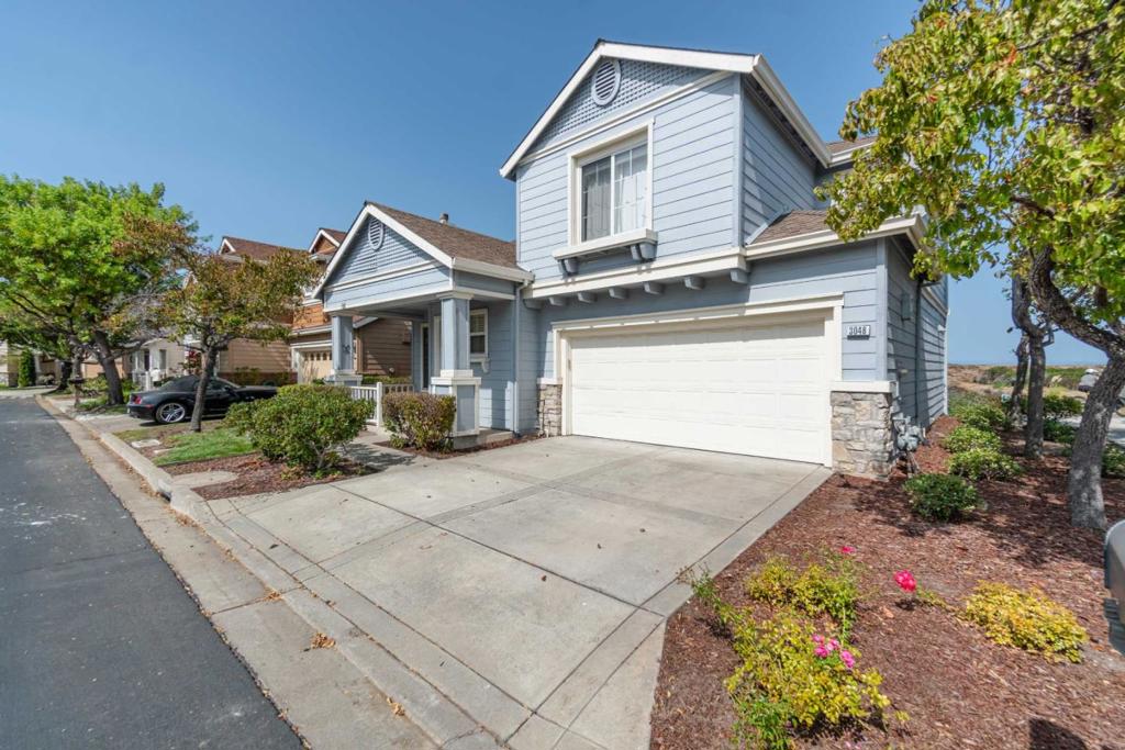 Be entranced by water and treetop views from practically every room in your future 2-story oasis. Entertain guests in the hardwood-finished living area with lofty ceilings, or have them help out with meal prep in the fully-finished, gourmet kitchen that comes with granite countertops and backsplash. Adjacent dining area and concrete stamped patio with an impressive view of the lagoon The master suite has a separate soak tub, glass-enclosed shower stall, and a walk-in closet. In-unit washer and dryer are available. Attached garage is very spacious and has modular shelves for extra storage. Served by exceptional schools including Redwood Shores Elementary and Carlmont High School. Major tech players such as Oracle and Electronic Arts are also easily reached by car. This charming home is also a great choice for outdoor lovers! Have a selection of biking, jogging, and walking trails right outside your door, without leaving your very safe & peaceful neighborhood!