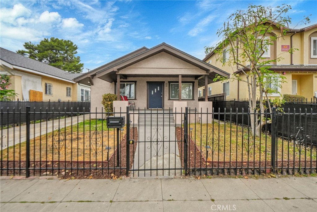 Welcome to this lovely home in the heart of Los Angeles. This property is Leimert Park adjacent and has everything ready for your fussiest buyers. Home is close to everything and is in immaculate condition. The home features a wonderful open layout that features beautiful wood flooring in the living areas. The beamed ceilings in the living and dining rooms bring elegance to the living areas! The bathroom has tiled flooring with updated fixtures throughout this home that makes it the perfect home for families and/or investors. The home has an interior laundry room with full size washer/dryer capabilities. The home also features a large 2 car garage with a long driveway that allows for plenty of parking. The home also has a newer roof. The home is also secured by a electric gate in the front for added security and parking. The backyard is humongous and offers plenty of opportunities for expansion or to build an ADU! The property features plenty of upgrades and potential so don't walk, run over to take a look and submit your offer as this hot property won't last!
