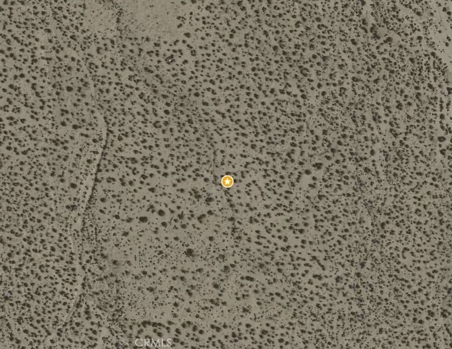 Almost 2.5 acres of untouched desert beauty in Palmdale’s rapidly growing Antelope Valley. This blank canvas offers sweeping desert views and wide-open skies. The lot currently has no direct road access and no utilities on site—an ideal opportunity for buyers seeking privacy and self-sufficiency. Zoning is rural/agricultural (check with L.A. County for specific uses). Buyer to investigate and satisfy themselves regarding access, utilities, and all permitting requirements. Create your own vision on this serene slice of desert paradise today.