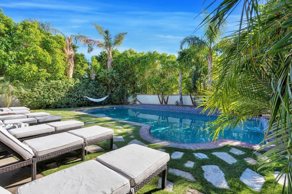 AS SEEN ON ADTV! Yes that is right! This home was featured on 2 episodes of American Dream TV. Contact Us Now For a Link to the Show and to VIEW THE PROPERTY!WOW! LOCATION, LOCATION, LOCATION! Just a couple blocks from Indian Wells Tennis Gardens this beautiful Estate has been a very successful Airbnb! With an abundance of entertainment space, sleeping quarters and bathrooms this home is fit for STR or the person who loves to entertain! With just over an acre of land there is a ton of options for improvement. Adding a tennis court or ADU would increase revenue as a rental or entertainment for you and your friends. Right in the heart of the action within the Palm Desert City Limits this stunning 7 bedroom 3.5 bath home comes turnkey furnished and move in ready! Mature landscape creates a private oasis right off the interior entertainment areas. The Bar, living room and kitchen all have amazing views of the pool. 3/4 of the lot is undeveloped and has numerous options to expand the entertainment space. Shown by appointment only, call now to schedule.