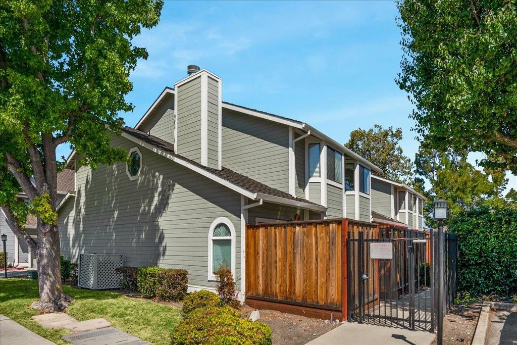 Welcome Home!! - Light and bright 3 bed room 2.5 bath townhouse - Easy commute location, close to restaurants and shopping. Desirable community features a sparkling pool. Home has an attached 2 car garage, lots of storage, laminate flooring, high ceilings, updated kitchen and baths, central a/c and more. Schedule showings: https://calendly.com/cindy-dominguez/1223-daniels-ct-milpitas