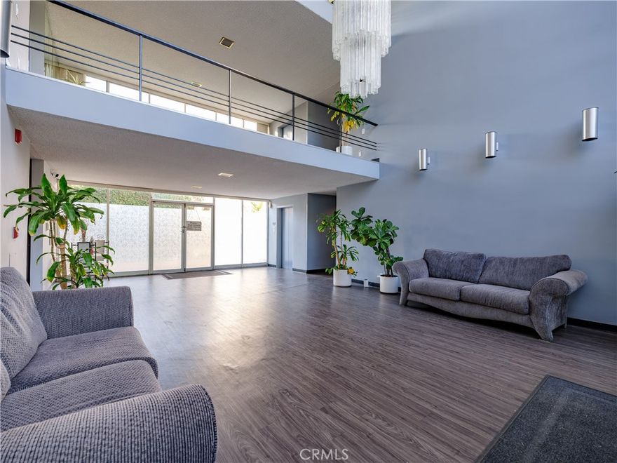 Available for lease in the highly desirable Chandler Estates neighborhood of Sherman Oaks, this rare, largest floor plan in the building offers a spacious 3-bedroom, 3-bathroom, single-level condo with an exceptional layout and abundant natural light. Freshly painted and move-in ready, the residence features wide-plank flooring, recessed lighting, and an expansive living and dining area ideal for both everyday living and entertaining. Large sliding glass doors open to a private covered balcony overlooking landscaped common areas perfect for morning coffee or evening relaxation. The generously sized kitchen includes granite countertops, ample cabinetry, stainless steel appliances, and a breakfast bar that connects seamlessly to the main living space. A separate dining nook adds flexibility rarely found in condo rentals. All three bedrooms are well proportioned with excellent separation of space. The primary suite offers generous closet space and a private en-suite bathroom. Three full bathrooms provide added convenience for families, roommates, guests, or a home office setup. The well-maintained elevator building features a welcoming lobby, resort-style pool, landscaped courtyard, covered parking, and additional storage. The architectural glass atrium fills common areas with natural light and creates an open, airy feel. Ideally located just minutes from Ventura Boulevard, Whole Foods, shopping, dining, parks, and major freeways including the 101 and 405, this home offers the perfect balance of convenience and quiet residential living.