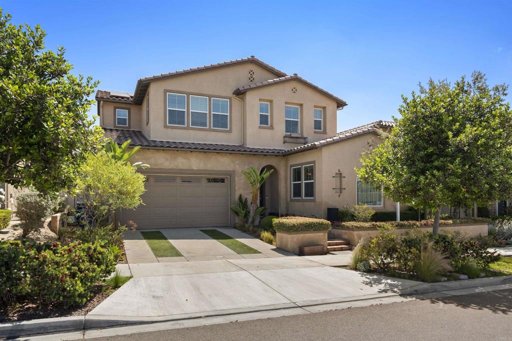 Welcome home! This home is a former model home with amazing added features! It has a gourmet kitchen upgraded with high-end stove, hood/range, large capacity double ovens, convenient pot filler. But the star of the kitchen is 30 feet of granite countertop & buffet style wall of cabinets, the large massive island with a waterfall. The hub of the home is the kitchen, and this kitchen can hold a lot of family and friends! You can throw the best parties in this space! The home also has two modern, electric fireplaces, one in the living room and the other in the outdoor California room. The California room is an added outdoor/indoor living space. The fifth bedroom, an upgrade included with this former model home, is a room with a full bathroom and attached living space. Perfect as a mother-in-law suite or to rent out. As you walk upstairs you are guided with the elaborate banister that takes you to the third living space, the loft. It can be used as a play area or a home theater or game room space. Moving to the master bedroom suite, it is a dream room with a spa inspired master bathroom and an oversized walk-in closet. The master bedroom has plush, padded carpeting and a built-in dresser drawer cabinet. The master bathroom will make you feel you are stepping into a spa with the large shower fit for a king and queen and a stylish soaking tub. The bathroom itself is bigger than a standard-sized bedroom! A lot of space to build your home spa. The backyard has a built-in island and high end BBQ grill for outdoor dining with the family and/or friends. The California room has a fireplace and an outdoor TV, perfect for alfresco dining or just for lounging outside. Throughout the house, you will also find custom decorative drapes and valances. The home is equipped with a tankless water heater. You will never run out of hot water. To save on the electric bill, solar panels are also included. The garage floor is coated with epoxy for a race car garage feel and also equipped with EV charging capabilities. The builder made this home a model home for all the right reasons…it is loaded with a lot of extra features with an impressive, large kitchen and equally impressive master suite! Don’t hesitate to view this home…you will fall in love!