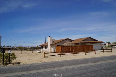 Photo of 4818 Round Up Road, 29 Palms, CA 92277 (MLS # JT25063540)
