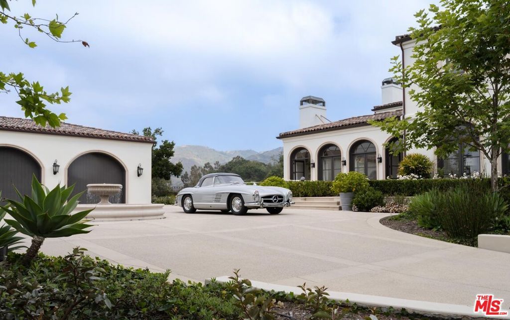 Photo of 12833 Chalon Road, Los Angeles, CA 90049 (MLS # 25561595)