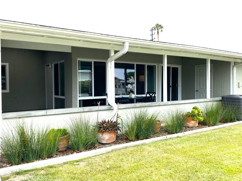 (M2-61J)(Carport 31, Space 15) Welcome home to this lovely location. The unit has a beautiful stamped concrete patio with storage and a skylight that overlooks a beautiful green. This 2 bedroom 1 bath unit has central heat/air, dual paned windows with a slider entry from the bedroom to the patio. The flooring is newer and the kitchen white and light with newer oven and white Formica counters. There are 3 skylights in the patio, kitchen (operable) and bathroom (operable). Close to laundry and parking. Come and See! SENIOR COMMUNITY OFFERS THE FOLLOWING AMENITIES: 9 Hole Golf Course, Swimming Pool, Jacuzzi, Gym, Table Tennis, Shuffleboard, Billiards, Pickle Ball and Bocce Ball courts. Amphitheater, 6 Club houses featuring: Exercise Gym, Art Room, Sewing, Crafts, Woodshops, Lapidary, Pool tables; Over 200 Clubs, LWSB is a Security-Guard-Gated Community. Also, Library, Friends of Library Bookstore, Credit Union, Health Care Center, Pharmacy), Post Office and Café.
