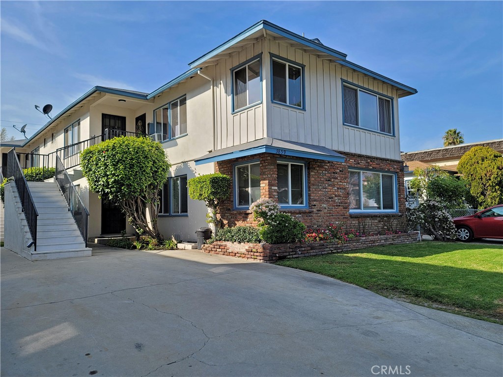 This beautiful, newly remodeled second-story home features luxury vinyl floors throughout and offers plenty of privacy. This desirable one-bedroom, one-bath unit boasts a large living room. The kitchen includes a new stove and refrigerator and features a breakfast nook. The full bath has a tiled shower and a soaker tub. Included is one parking space, and the complex has a laundry room with a washer and dryer. There is a grassy front lawn, and small pets are allowed with a deposit.