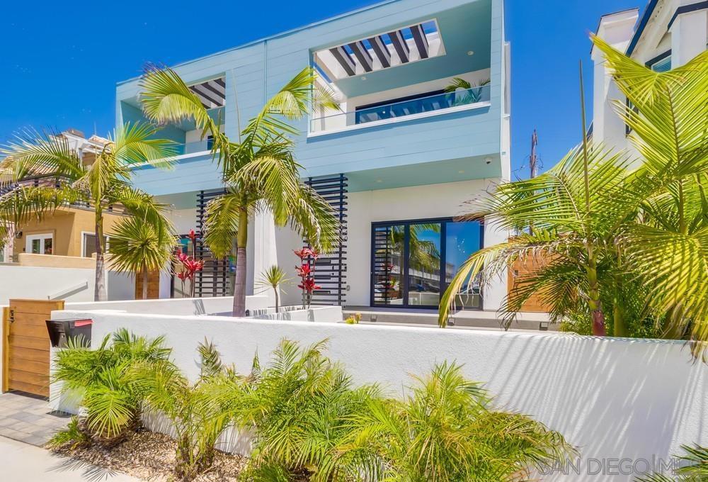 *First Time on Market* 3 Bedroom 2.5 Bath custom designed modern beach home located just steps to the beach. This location provides for unobstructed south facing estuary views and rooftop ocean views. The living room has 10.5' ceilings with Lifx recessed lighting, La Cantina Bi-Folding doors systems, 2'X4' porcelain tile floors, grand floating staircase, rooftop jacuzzi with multi-zone heating & air systems. The entire house is hardwired with CAT 5 wiring, multiple interior and exterior wifi access points, IC Realtime dome security cameras, FX Luminaire landscape lighting system with built-in BBQ and water feature off the kitchen. All bathrooms consist of floating cabinetry with quartz countertops and Delta shower & bath trim. This property was constructed with a 3" airspace gap and separate detached foundation from neighboring unit. Multiple skylights run along the upstairs hallway for plenty of light.