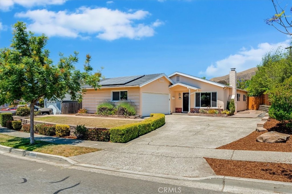Located in the Sinsheimer School District, this single level home offers 1,150 sq' with 3 bedrooms and 2 baths. The living room receives an abundance of natural light from the front bay window and the fireplace will offer warmth and ambiance during cooler weather. This property offers a spacious 5,800+ sq' lot complemented by mature trees, chicken coop and a concrete patio with built-in gas fire pit perfect for outdoor entertaining and enjoying San Luis Obispo's weather. A large two-car garage provides ample parking and storage. Owned solar system. Situated in an established neighborhood with no HOA fees, this home is conveniently close to the YMCA, parks, coffee shops, and other local amenities, making it a great place to enjoy the SLO lifestyle.