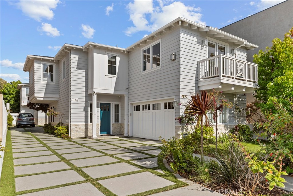 Nestled on a tranquil, coveted street, just two blocks from the sparkling ocean, this pristine two-story townhome in the heart of South Redondo offers an unparalleled blend of luxury and comfort. Crafted with the finest materials and impeccable craftsmanship, this residence is designed for sophisticated living and effortless entertaining. Step inside and discover a bright, open floor plan accentuated by raised ceilings, elegant crown molding, 8-foot doors, wide-plank wood floors and surround sound, creating an inviting and expansive atmosphere. The gourmet kitchen is a culinary masterpiece, boasting top-of-the-line Thermador appliances, a stunning Calacatta stone center island, a convenient pantry, and abundant storage. The seamlessly integrated living and dining areas, complete with a stone-lined fireplace and a dedicated office space, provide the perfect setting for gatherings and relaxation. Wide sliding doors open to a private outdoor oasis, ideal for al fresco enjoyment. This meticulously designed space features paving, lush landscaping, a built-in fireplace, and a wide-screen television, ensuring memorable evenings under the stars. Upstairs, the expansive primary suite is a true sanctuary, featuring its own fireplace, a private deck, and a spacious walk-in closet with custom built-ins. The spa-like primary bathroom indulges with a separate soaking tub, a custom shower, and dual sinks. The second floor also offers an en-suite bedroom with a private bath, two additional generously sized bedrooms, another full bath, and a large laundry room with built-in cabinets and a sink. Enjoy the ultimate coastal lifestyle with easy access to everything South Redondo has to offer, including the beach and beautiful parks. Stroll along the Esplanade to enjoy acclaimed restaurants and upscale shopping in the Rivera Village. This exceptional townhome is more than just a residence; it's a dream home in a perfect setting.
