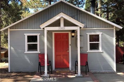 Photo of 33401 Bluebird Dr, Green Valley Lake, CA 92341 (MLS # OC26027221)