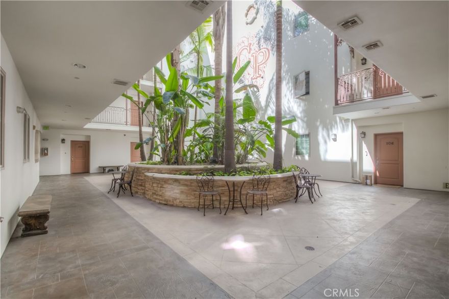 Now available!  Walk in through a beautiful entry of this gorgeous condo and enjoy a peaceful atmosphere of a spacious courtyard area. This luxurious 2 bedroom 2 bath condo at Chelsea Place boasts of high end finishes throughout. Its spacious kitchen features custom cabinetry, granite countertop, and beautiful backsplashes. The kitchen is complimented with quality appliances and long granite breakfast bar. The open floor plan has a spacious livingroom area with an electric fireplace. Master bedroom has huge His and Her Walk in Closet with built in shelves and the master bathroom has granite countertops with dual sinks, separate shower and bathtub. This condo is plumbed for washer and dryer hookups for your convenience. Chelsea Place is secured with CCTV and has security functions in the elevators. Two parking tandem spaces in the subterranean garage. This luxury condo in Studio City is conveniently located in close proximity to the freeways, shops and world-class eatery on Ventura Blvd.