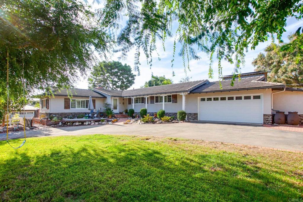 Welcome to your future home! Located in the coveted Fire Mountain neighborhood, this charming and very well maintained, single-level 2-bedroom, 2-bathroom residence offers 1,399 square feet of well-designed living space on an impressive 16,138 square foot lot! Step inside to discover a spacious living room complete with a cozy fireplace, perfect for relaxing evenings. The easy-to-maintain flooring throughout enhances the indoor-outdoor flow, making it ideal for the laid-back Southern California lifestyle. The heart of this home is a generously-sized kitchen with ample storage, an inviting island, and an adjacent dining room that opens up to a west-facing patio deck, perfect for alfresco dining and gatherings. Outdoor enthusiasts will appreciate the driveway with multiple street access points and RV/boat parking with clean-out access. The private outdoor space is adorned with mature landscaping and fruit trees, offering a retreat like setting or an ideal space for entertaining guests. The front yard features a lovely deck while the backyard boasts a patio and a separate area with a fire pit. Plus, there's ample room to bring your ideas to life, whether you envision an ADU, a pool, or a possible home expansion. This unique corner lot home is a gem in a sought-after location. It is located just minutes away from beaches, famous Oceanside Pier, Oceanside Harbor and Carlsbad Village . Schools and shopping is nearby. With easy freeway acecss and accessibility to all major Southern California airports , you don't miss a chance to call this place your home.