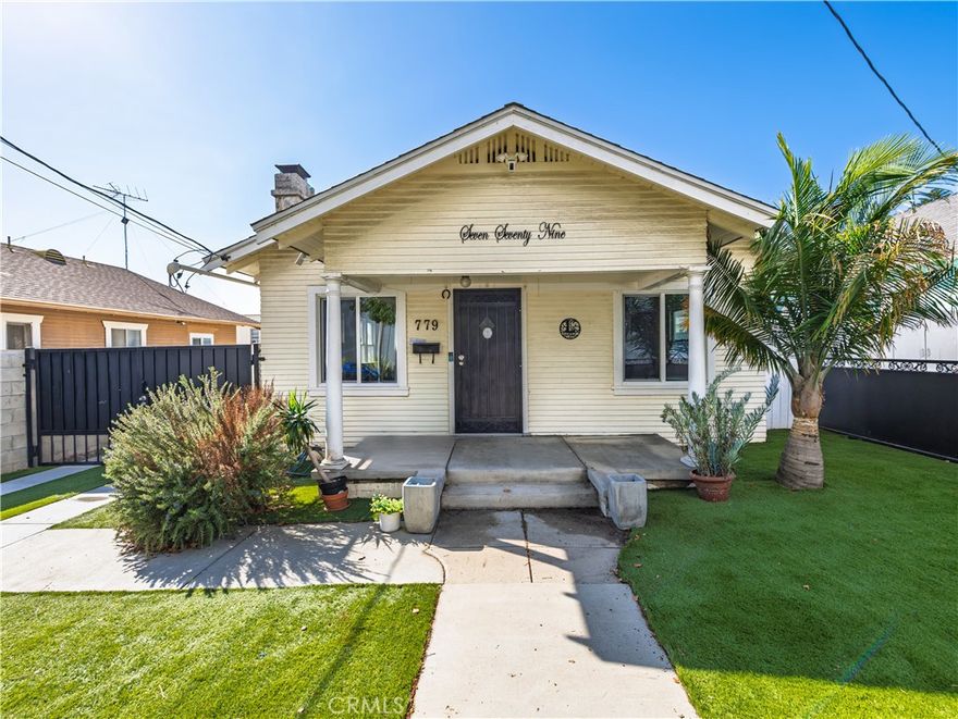 Welcome home to this charming bungalow featuring a lovely front yard, new patio, spacious backyard and new double entry garage! The comfortable layout includes two bedrooms, one bath, an open living room and dining room and traditional craftsman style kitchen. The new living-room windows and recessed lighting offer a bright and inviting atmosphere. The living room is centered around a beautiful detailed fireplace and the dinning room features a charming built in buffet. This home combines modern amenities such as central AC & heat, and bamboo floors while keeping a traditional style and look to the home. The home has a large driveway with plenty of parking, for cars, RV or boat, including a new two car garage and separate laundry room. The newly landscaped front and backyard have plenty of room to entertain and the new turf offers low maintenance, improved water conservation and a greener alternative to natural grass. This newly fenced home also includes the convenience of an automated gate. Conveniently located to restaurants, schools, grocery stores, and close to the new West Harbor LA waterfront development.