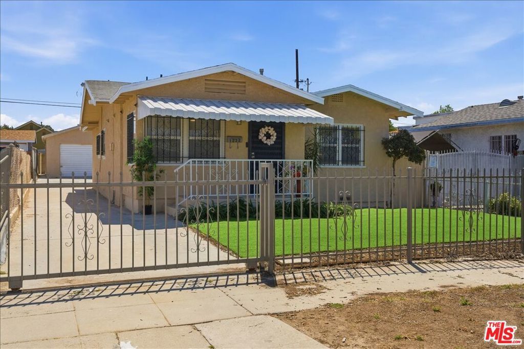 Photo of 1232 W 74th Street, Los Angeles, CA 90044 (MLS # 26730519)