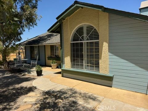Photo of 21800 Isatis AVE, Apple Valley, CA 92307 (MLS # HD26161374)