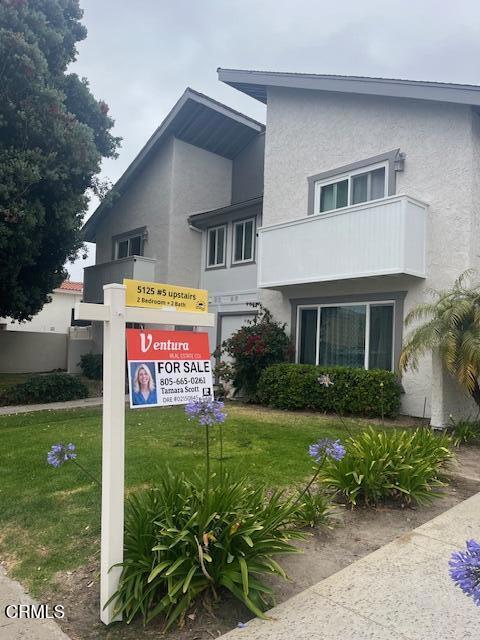 Live at the beach. Move in ready upstairs condo. This is steps from the beach and close to restaurants and shopping. Open concept with light filled space. Enjoy the patio and ocean breezes. Make your coastal dreams a reality.