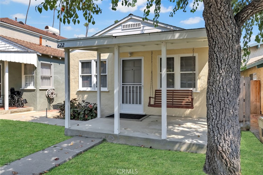This is your opportunity to own the lowest-priced single-family detached home in the coveted Downtown Huntington Beach neighborhood. Situated on the highly sought-after numbered streets, this charming beach cottage sits on a full legal lot (25’ x 117’) with no oil well restrictions—meaning you can remodel, expand, or build your dream three-story coastal masterpiece.
Currently featuring 1 bedroom and 1 bathroom, the home offers a cozy living room, dining nook, and functional kitchen, plus a rear deck and grassy yard perfect for BBQs and entertaining. The property also includes a detached 1-car garage with alley access and additional parking.
Whether you envision a vacation retreat, income-producing rental, or brand-new custom build, this location is unbeatable—just a short stroll to Main Street’s restaurants, the iconic Huntington Beach Pier, the world-class beach, and the trendy Pacific City shopping and dining destination.
Immaculately maintained inside and out. Opportunities like this are rare—secure your place in Surf City today!