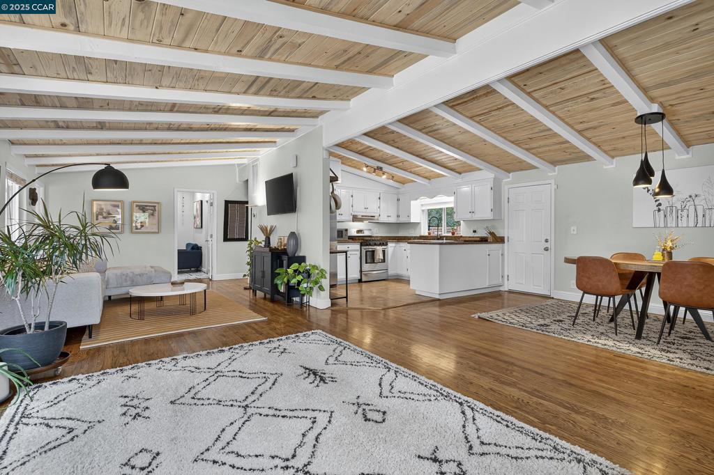 This absolutely delicious mid-century modern home blends character, charm, and a refined confidence. It’s the kind of home that makes you smile the moment you step onto the original hardwood floors under the embrace of its vaulted ceilings. The backyard gives mini-courtyard vibes with a full-spectrum orchard of developing fruit trees: Persimmon, Lemon, Pomegranate, Apricot, Peach, and Fig, offering the kind of tree diversity that practically makes its own fruit cocktail. An additional front yard lined with mature rosemary bushes provides bonus space for any outdoor activities such as a dinner party, barbeque, play space, and more. Conveniently located just off Highway 4, you’re less than five minutes away from grocery stores, coffee shops, and local restaurants. This home is a commuters dream. Martinez is right on the bay and has a charming historical downtown scene.