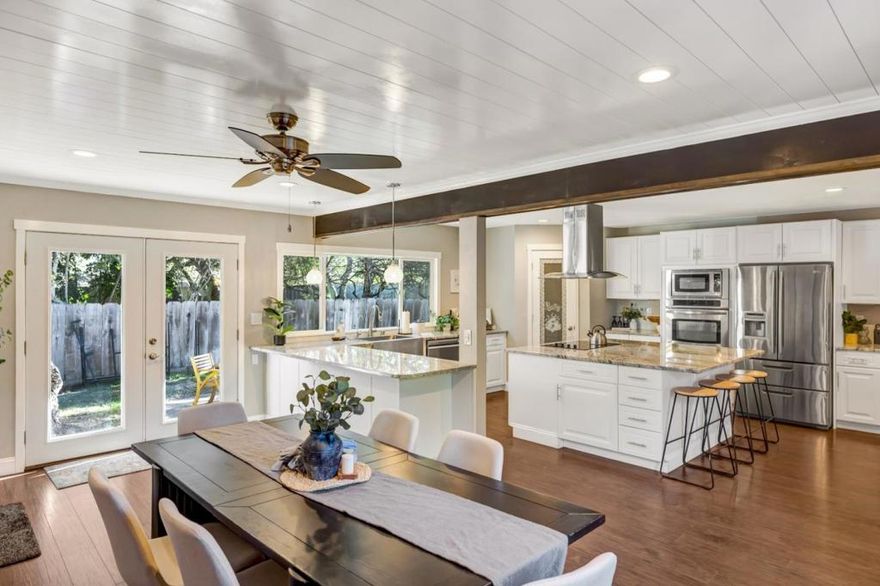 OPEN HOUSE SUN 12/28 FROM 12:30 PM - 3:30 PM. COME VIEW THIS STUNNING HOME IN PERSON!  Beautifully Remodeled Oak Hills Home on a Large Private Lot! This inviting 4 bd / 2 ba home has been beautifully renovated and sits on an oversized 1/3+ acre lot. The chef's kitchen features a huge island, plenty of cabinetry, stainless steel appliances, and a walk-in pantry. Fresh paint, new flooring and updated bathrooms make the home clean and move-in ready. The spacious living room with a cozy fireplace sits at the back of the home and looks out over the large backyard. The backyard has a large patio which is perfect for relaxing or entertaining. Set back from the street, this property offers great privacy and space, with dual driveways, room to park a boat or RV, and an oversized three-car garage. Centrally located with easy access to shopping, local beaches, parks, and schools - this home is ready for you to move in and enjoy!