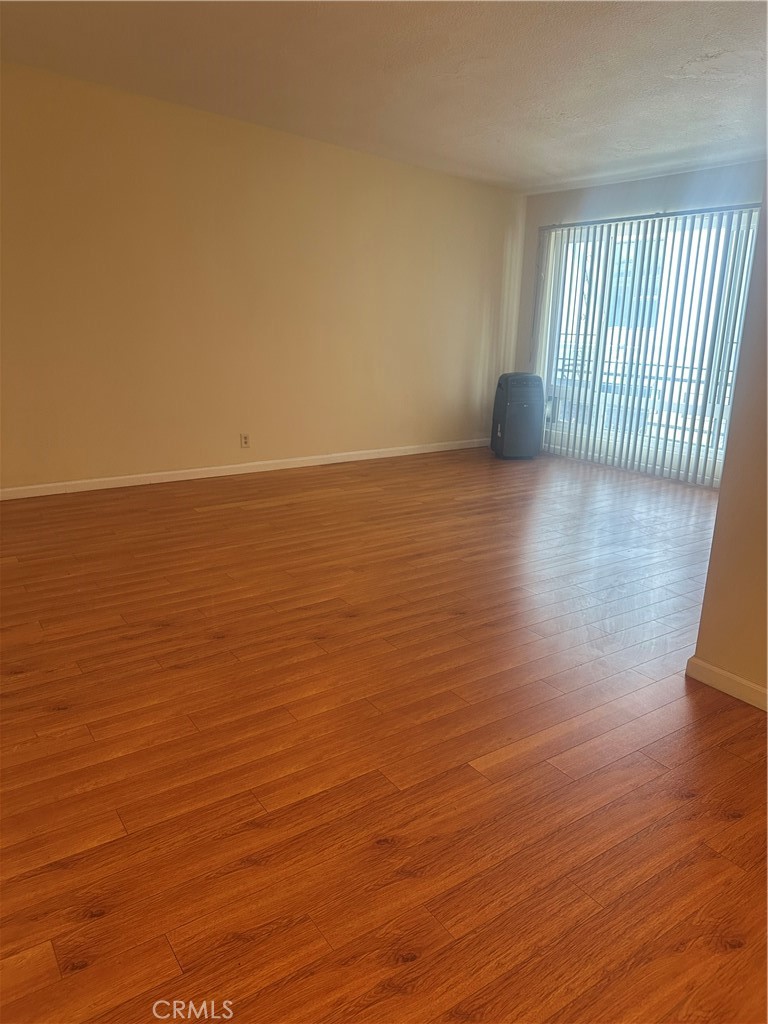 In the heart of Korea Town. Well maintained and updated clean unit. All wood flooring. 1 parking space included in the lease.