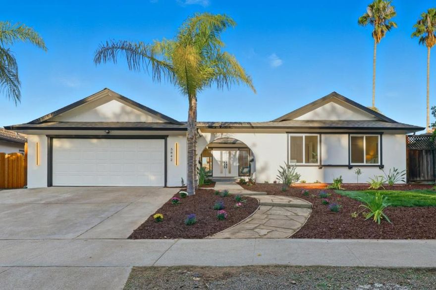 Nestled in one of Almaden Valley most desirable neighborhoods, this stunning 4 BD/2.5 BA single-story residence has been extensively remodeled with permits, blending modern design, functionality, and comfort. The open-concept layout welcomes you with high ceilings, brand-new engineer hardwood floors, and an abundance of natural light streaming through new dual-pane windows & sliding doors. The living room features high ceilings and a large sliding glass door opens to a lush, newly landscaped backyard - an ideal retreat for both entertaining and quiet outdoor enjoyment. The chefs kitchen is a masterpiece of style and functionality, boasting customized European-style cabinetry, a central island, and brand-new top-end appliances including a 36-inch gas range and microwave drawer. The oversized dining room is perfect for hosting family and friends, while the spacious and private primary suite offers direct access to the backyard and a spa-inspired bath featuring a free-standing soaking tub, dual sinks, and designer finishes. Three additional bedrooms are well-appointed. Easy access to top-rated schools, Costco, shopping centers, restaurants, and Almaden Expy, Hwy 85 & 87. Just minutes from hillside trails at Almaden Quicksilver & quiet oak-woodland walks at Guadalupe Oak Grove Park.