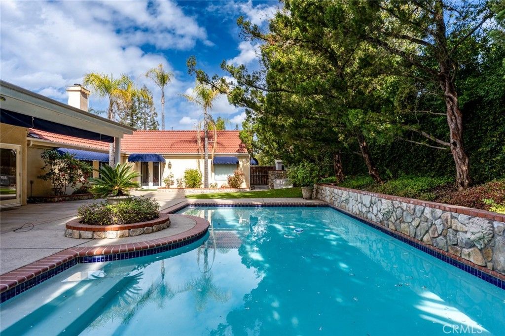 Photo of 9484 N Woodmont Drive, Fresno, CA 93720 (MLS # FR26056058)