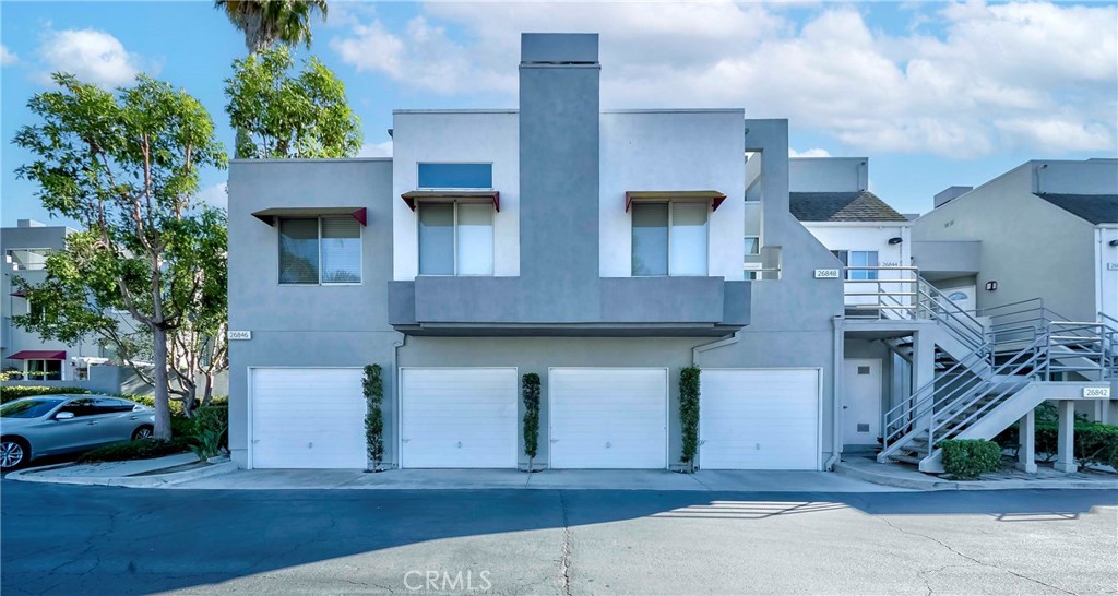 Beautifully upgraded and ready for you to move in! Great floorplan with everything on one level. This unit has no one below - first floor space is the garage. All new pipes in plumbing, recently completed by the HOA for the community. This unit also has brand-new paint throughout, including doors and baseboards - an inviting white throughout living spaces, kitchen and bathroom. Kitchen has been completely updated with new cabinets, countertops, sink, backsplash, and stainless steel appliances. Dining room has swing louvre doors, providing enough separation to give you the option for a quiet office or temporary guest space. The bedroom is very spacious and includes a large walk-in closet. No mello-roos, low HOA and access to Lake Mission Viejo! Easy access to local shopping, dining, schools and parks.