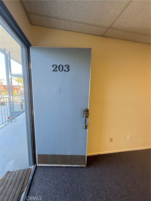 Photo of 1233 W Gardena Boulevard #203, Gardena, CA 90247 (MLS # SB25147606)