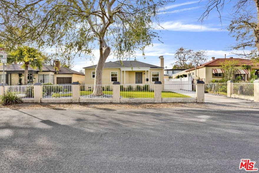 Situated in a quiet neighborhood, this elegant traditional single-family residence is offered for lease in North Hollywood.  The home features 3 bedrooms, 2 bathrooms, encompassing approximately 1,244 square feet of thoughtfully updated living space with a functional layout well suited for both everyday living and entertaining.  Recent Interior and Exterior updates include updated flooring, recessed lighting, and central HVAC.  The inviting living room is highlighted by a classic fireplace, while the kitchen is tastefully appointed with clean countertops, white cabinetry, and stainless steel appliances.  The generously sized primary bedroom opens directly to the backyard and is complemented by refined finishes and upgraded fixtures.  The private backyard offers ample outdoor space with an open patio ideal for al fresco dining or entertaining.  A rare opportunity to lease a well-maintained residence in the desirable North Hollywood Arts District, offering a balance of privacy, comfort, and convenient access to local dining, entertainment, and culture.