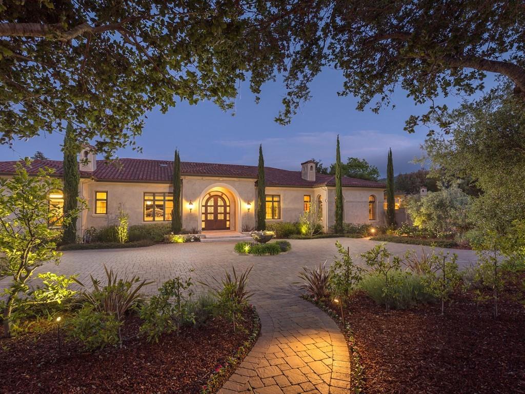 Custom 7064+/- sq. ft. designed by famed architect Chris Spaulding*Built by renowned high-end builders Dave Flick & Dave Morey*Generous 1.42 +/- acre lot*Main house includes 5 bedrooms, 5 & 1/2 bathrooms & office*Great Room*Guest Cottage includes 1 bedroom, 1 bathroom, full kitchen, fireplace*Walnut flooring & designer architectural lighting system with high-end finishes*Kitchen features Brazilian imported Granite, 6 burner Wolf range with griddle & custom hand-forged stainless steel hood, 2 Thermador dishwashers, Subzero refrigerator, over-sized prep sink, wine refrigerator, warming drawer*butler's pantry*3 car garage & 2 car covered carport*Solar panels, heated pool, putting green & cozy covered patio with fireplace/TV*3 indoor gas fireplaces, 1 outdoor gas fireplace & 1 custom fire pit in the backyard*Automated drip system managed by mobile app, landscaping with 4000+ plants, heritage oaks, 50+ year old fig trees*Distinguished Saratoga school district!