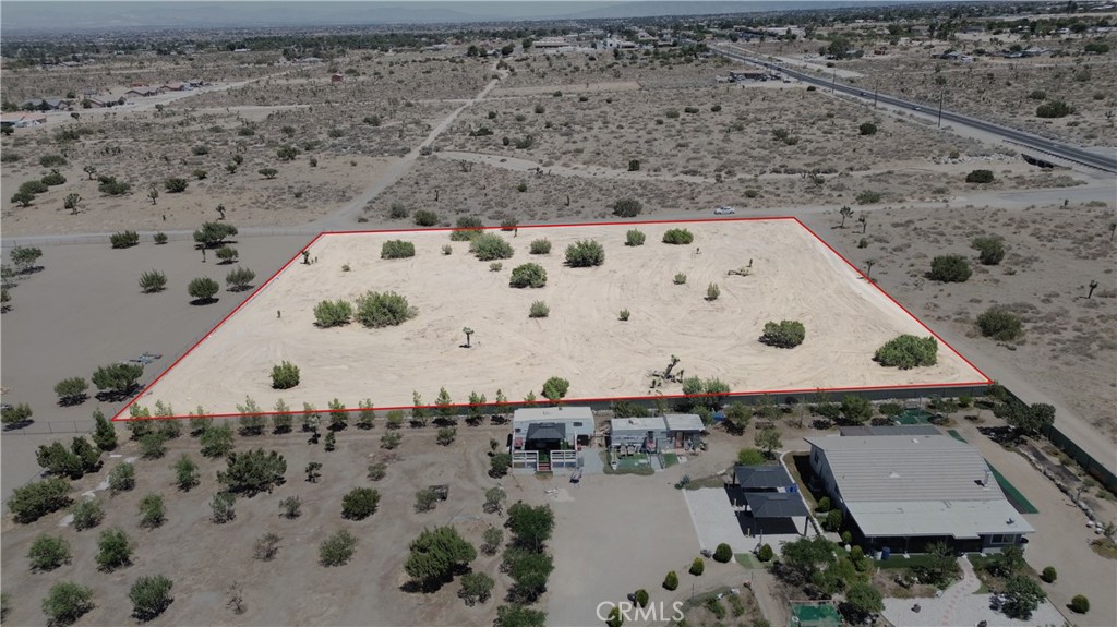 EXCELLENT LOCATION!! OPPORTUNITY AWAITS WITH THIS 2.27 ACRES OF VACANT COMERCIAL/ RESIDENTIAL LAND ONLY 250 FEET FROM PAVED PHELAN RD AND LESS THAN A MILE FROM HIGHWAY 138. WITH WATER AND POWER NEAR BY READY FOR DEVELOPMENT. WHETHER YOU'RE LOOKING TO BUILD YOUR NEW HOME, START A BUSINESS OR INVEST IN THE GROWING AREA. THE LAND'S FLEXIBLE ZONING SUPPORT BOTH RESIDENTIAL AND COMERCIAL USE. HAS EXISTING CHAIN LINK FENCES ON 2 SIDES ALREADY FROM NEIGHBORING PROPERTIES. ONLY 1/4 MILE FROM STATER BROTHER'S, SNOW LINE SCHOOL DISTRICT AND CLOSE TO SHOPPING CENTER. DON'T MISS THIS OPPORTUNITY!!!
