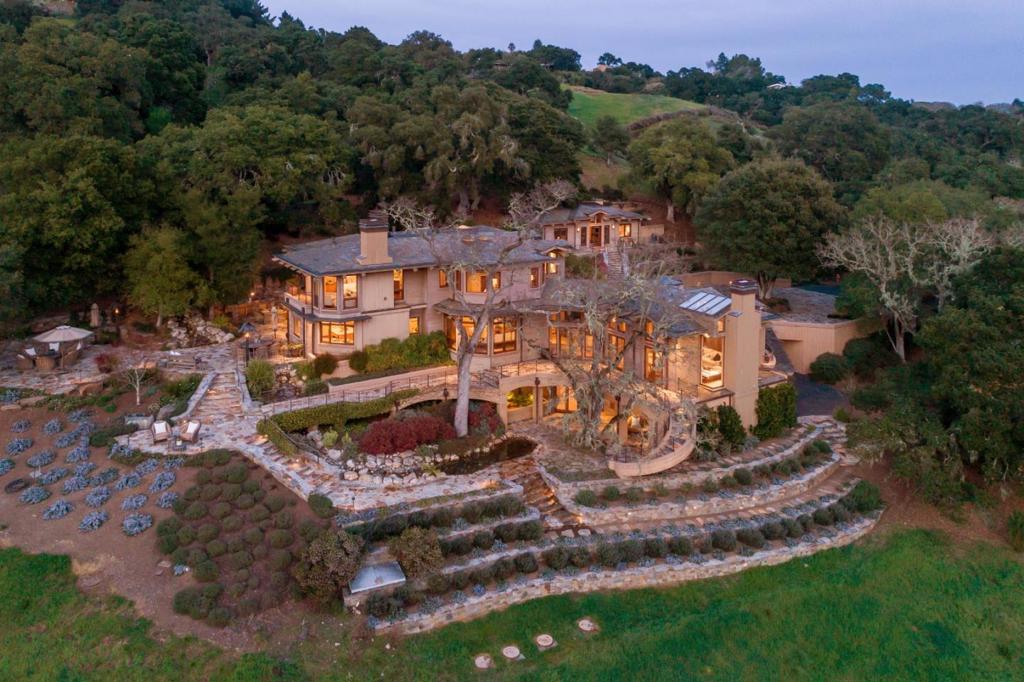 Welcome to this custom-built masterpiece on 18 acres in the heart of central Portola Valley overlooking Jasper Ridge Biological Preserve. Located at the end of a long gated driveway, this magnificent property was built in 2001 by renowned builder RJ Dailey Construction. A just-completed remodel has transformed the home with the addition of two-bedroom suites, new and remodeled bathrooms, plus a renovation to the guest house. The interiors and the landscaping blend harmoniously, emanating the natural elements of earth, water, and wood with subtle textures and soothing sounds from every vantage point. Extensive use of limestone and fine hardwoods are found throughout the three levels, all connected by a commercial-sized elevator. Massive view windows, some with corners of edge-to-edge glass, plus numerous skylights and French doors fill the home with light. Not occupied. www.127pinon.com