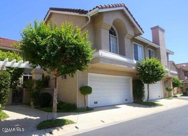 Located in beautiful Wood Ranch, this home features 3 bedrooms, 2 1/2 baths and approximately 1579 sf of living space. Gorgeous courtyard welcomes you in with garden & private entry. The family room features vaulted ceilings and tiled, gas fireplace. The eat-in kitchen has large windows to take in the courtyard view and boasts beautiful granite countertops, tile floors, dishwasher, new gas range, microwave and plenty of storage. Wood-like flooring is featured downstairs with Travertine tile on the stairs and upper hallway. All bedrooms are located upstairs, and secondary bedrooms are carpeted. This home has air-conditioning and each bedroom has its own ceiling fan. Large master bathroom with ensuite bathroom and walk-in closet. The rear patio is tiled and is a wonderful oasis for entertaining friends. The laundry area is located downstairs. 2 car, attached garage included. The desirable community of Village on the Green offers a pool/spa facility and great guest parking. Local golf course, restaurants, shopping centers and Wood Ranch trails are nearby. Easy commute to Moorpark, Thousand Oaks and Simi Valley and Cal Lutheran University.